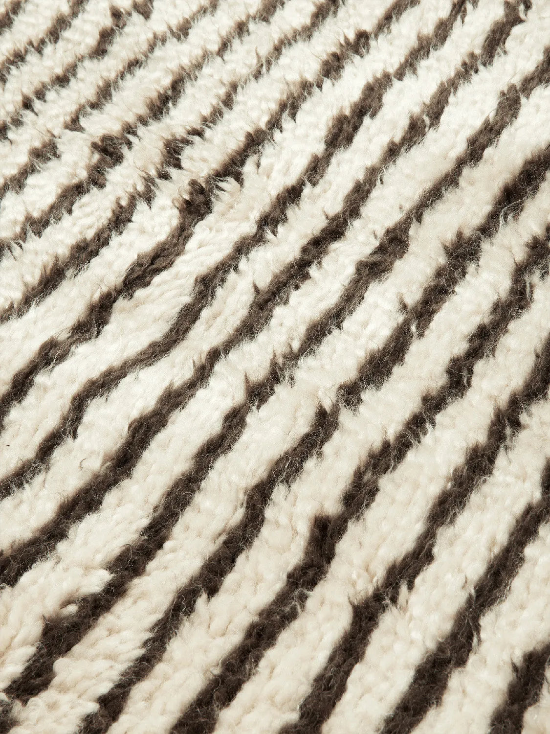 Kami Knotted Teppich 80 x 120  in  Offwhite/Coffee präsentiert im Onlineshop von KAQTU Design AG. Teppich ist von Ferm Living