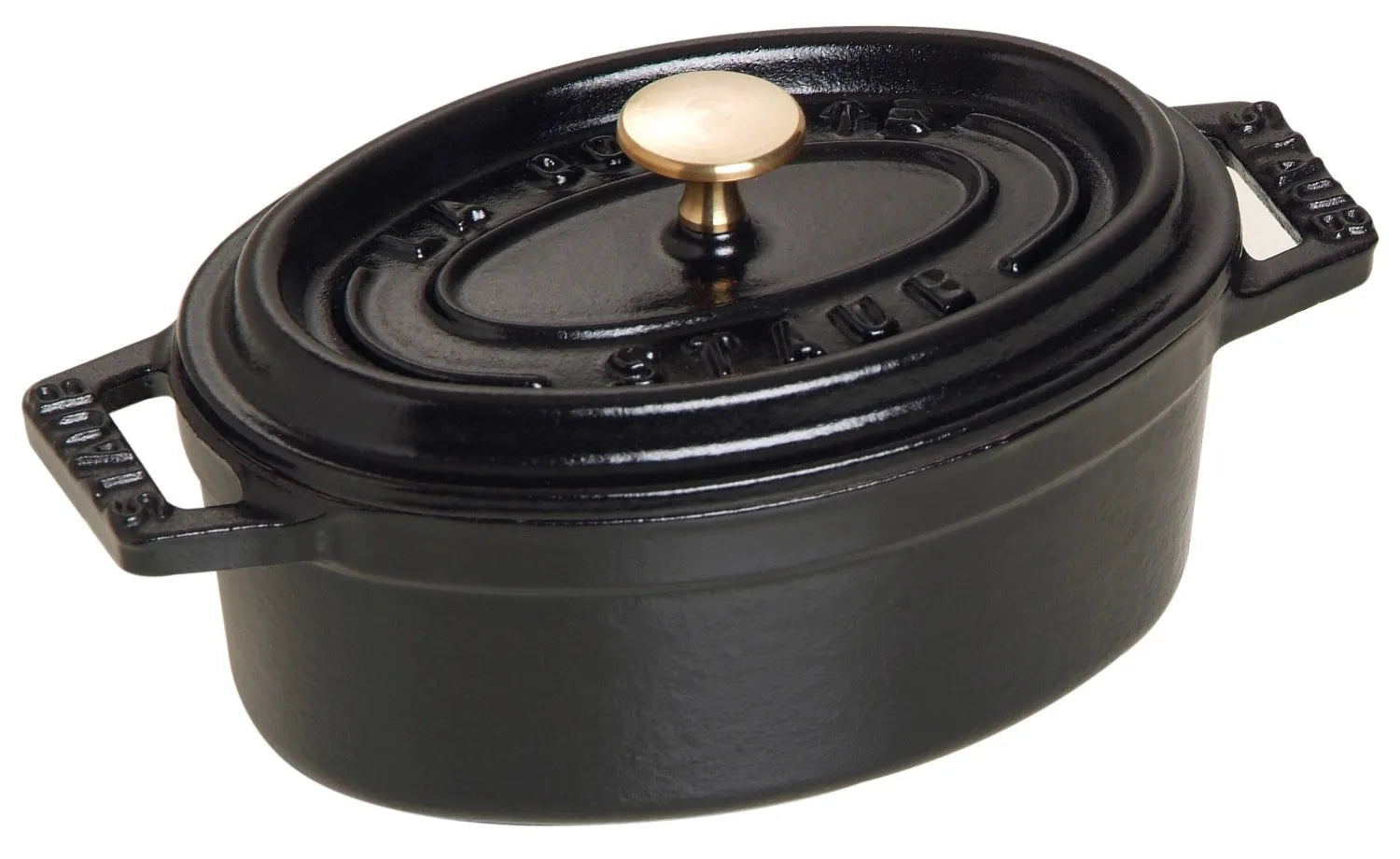 Die Mini Cocotte oval 0.25l von Staub: Gusseisen, perfekte Wärmeverteilung, feuchtigkeitsdichter Deckel, elegant und vielseitig.