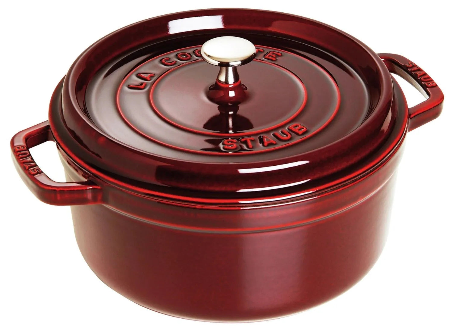 Die Staub Cocotte 24 cm in Grenadine-Rot: Hochwertiges Gusseisen, 3,8l Volumen, perfekte Wärmespeicherung, stilvoll und langlebig.