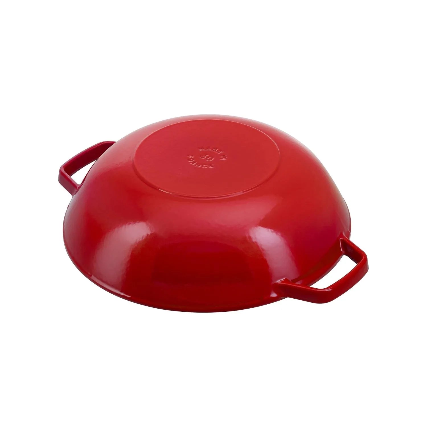 Robuster 4.4l Staub Wok aus Gusseisen mit Glasdeckel, ideal für gleichmäßiges Garen und vielseitige Gerichte. Für alle Herdarten geeignet.