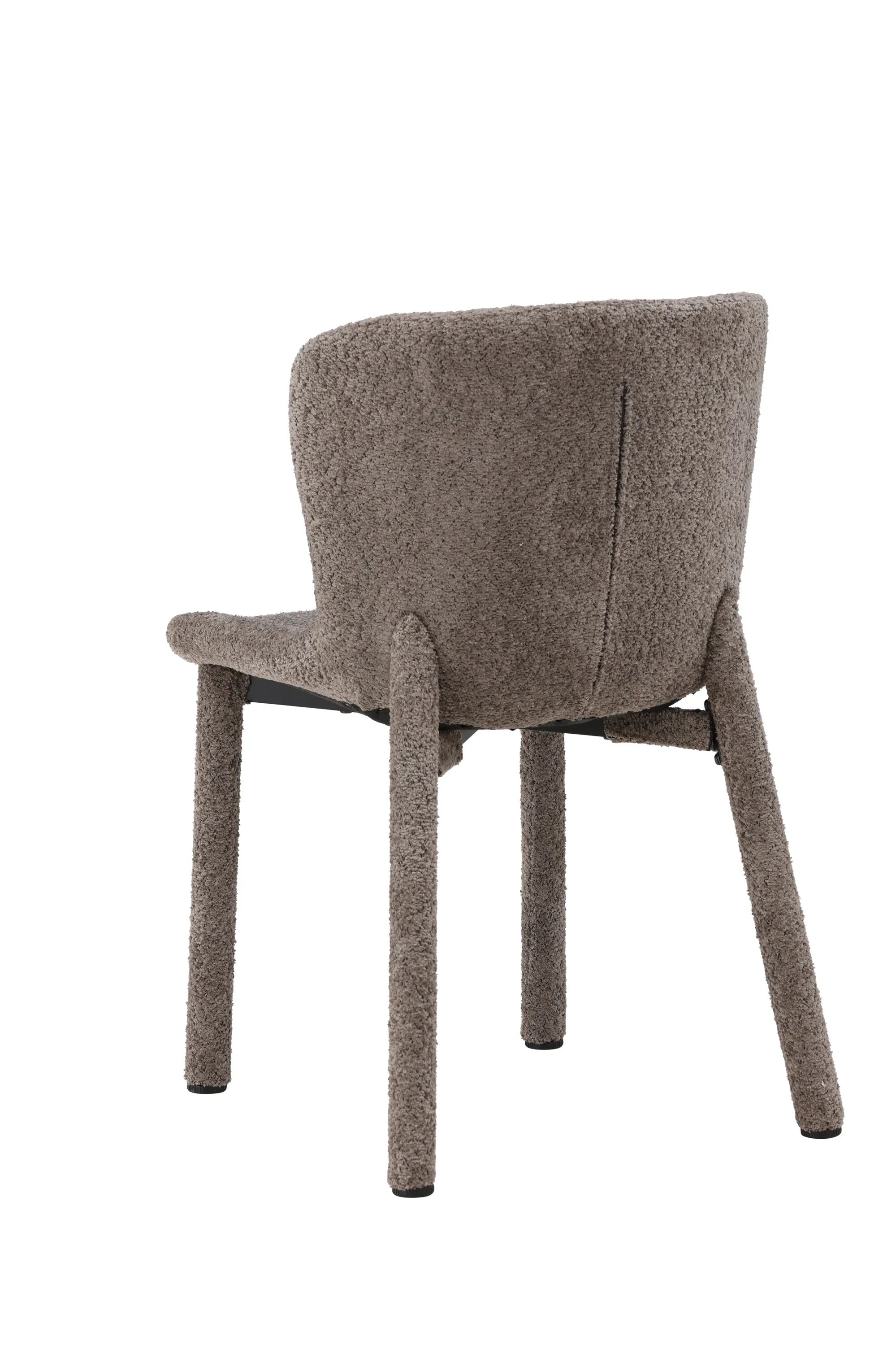 Der Astoria Esszimmerstuhl vereint luxuriösen Bouclé-Stoff mit ergonomischem Design für stilvollen Komfort.