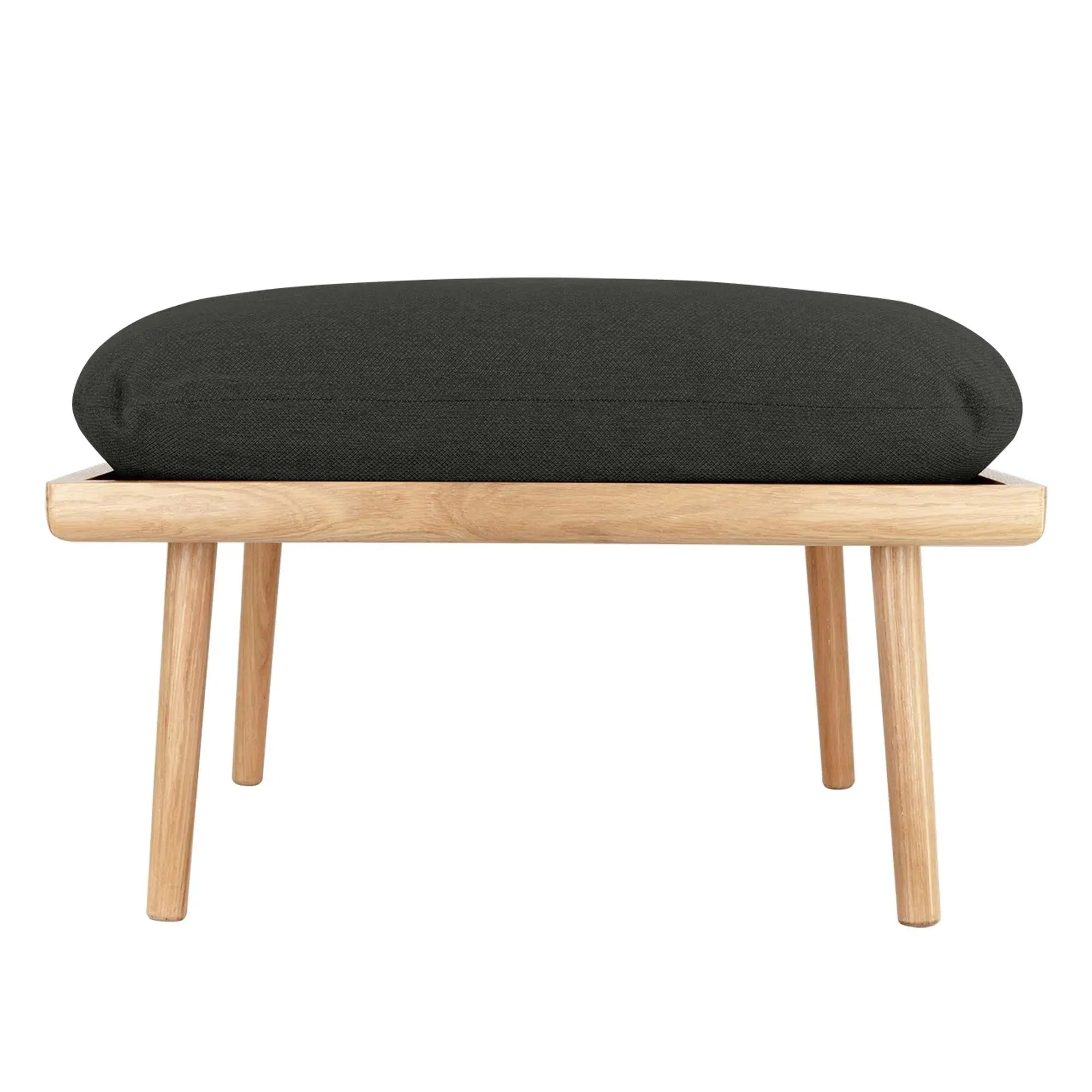 Vielseitiger Pouffe von Umage für flexible Wohnraumgestaltung.