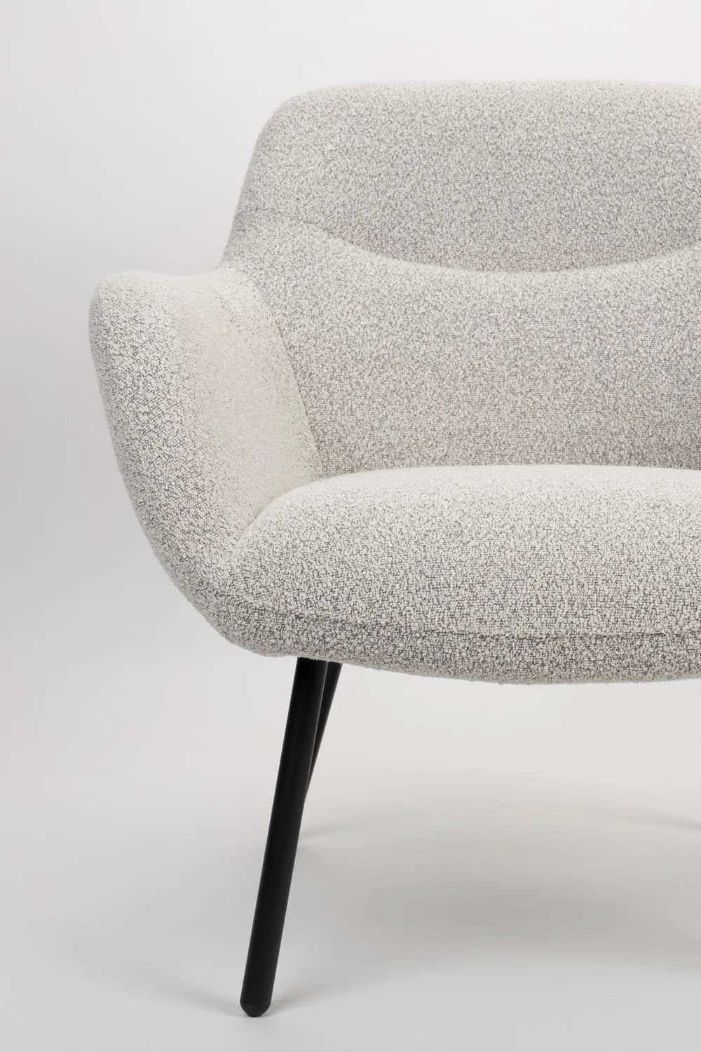 Stilvoller Bouclé-Sessel: Komfort und Design für Ihr Wohnzimmer.