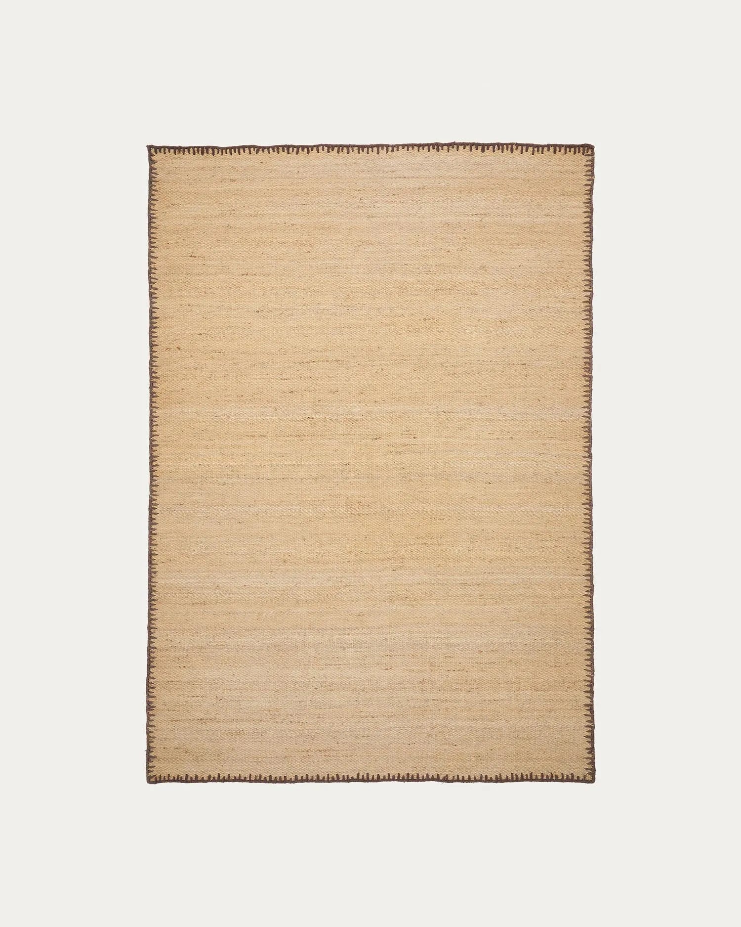 Sorina Jute-Teppich 160x230 cm, natur mit braunem Rand, nachhaltig, stilvoll, robust, ideal für Wohn- und Schlafräume.